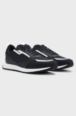 Mixed-material trainers with branded accents1
